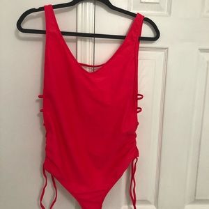 Bright pink one piece swimsuit